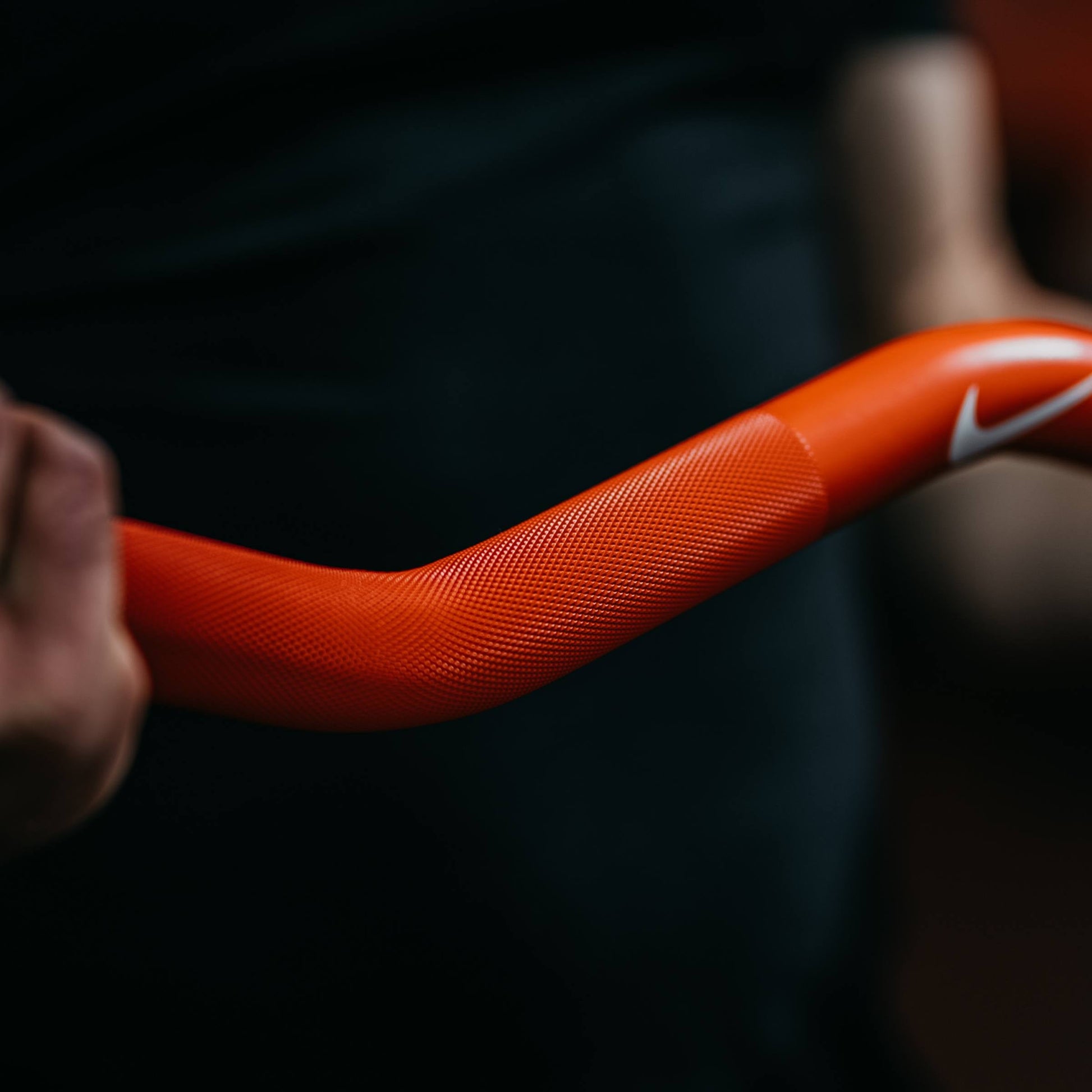 Nike Strength Shield Curl Bar - Orange SWOOSH / Nike Strength Pro Urethane Plates (1.25 - 5 kg pairs) / Black/Orange