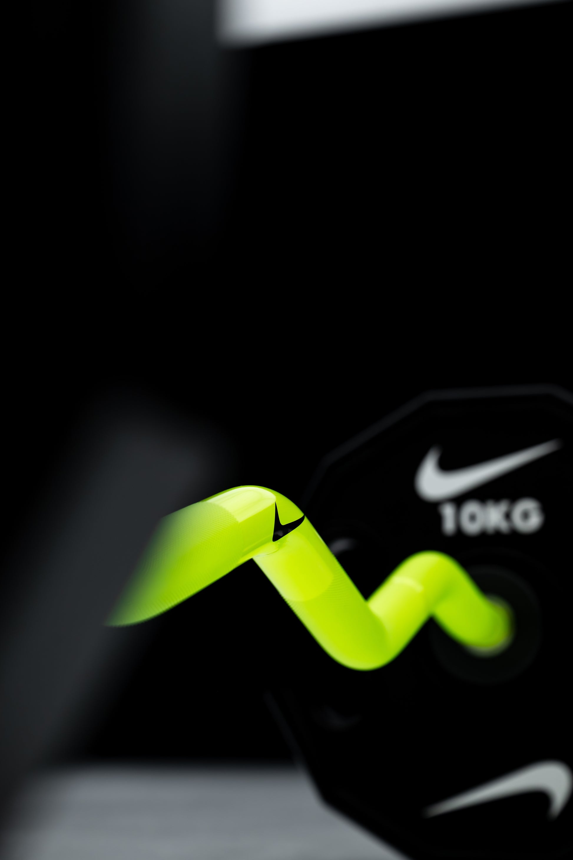Nike Strength Shield Curl Bar - Volt Swoosh / Nike Strength Pro Urethane Plates (1.25 - 5 kg pairs) / White/Orange